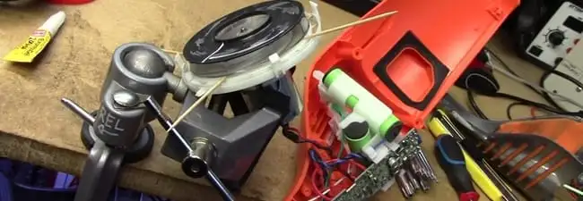 Vacuum cleaner repair parts and tools on a workbench in Boise, ID